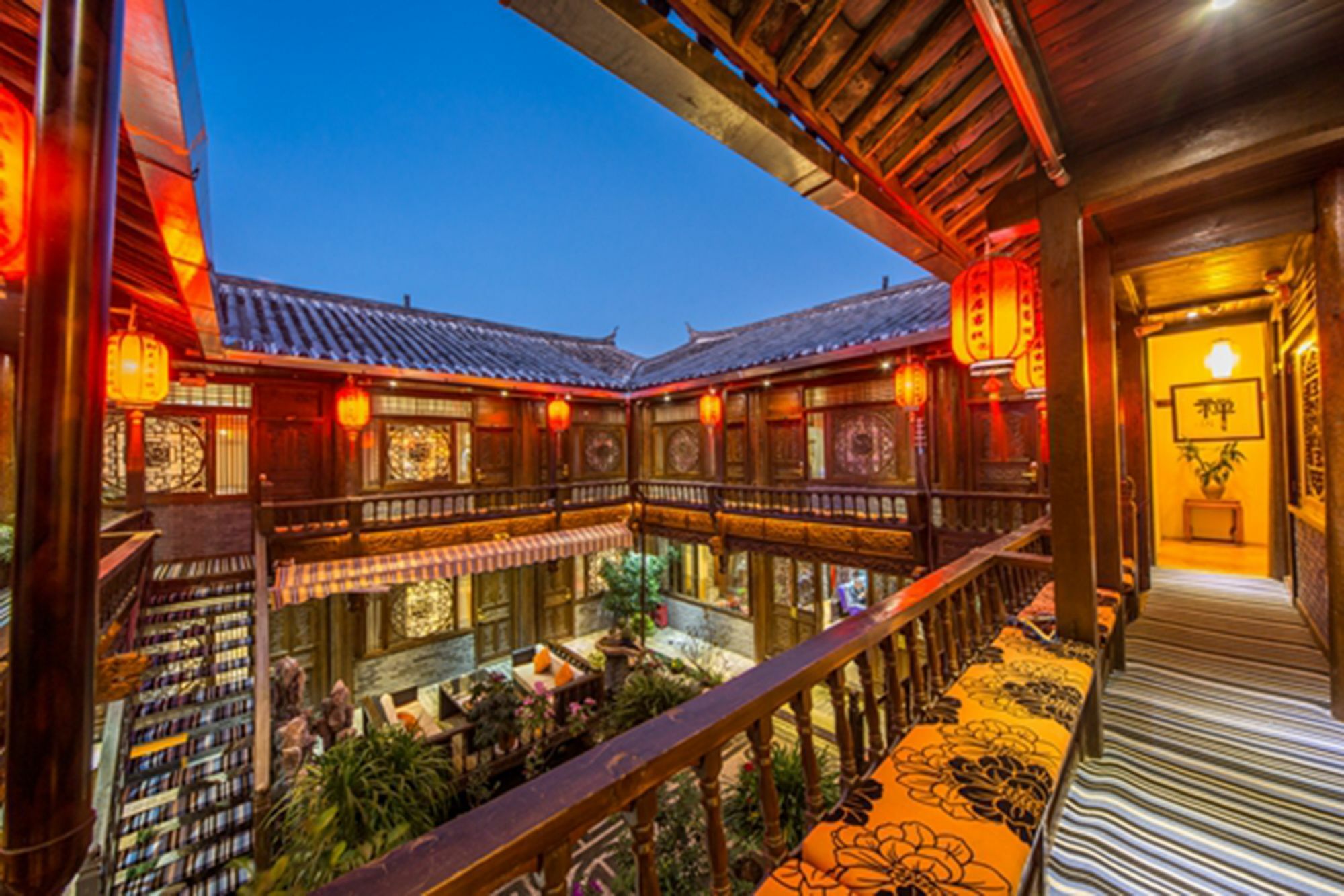 He Mu Ju Inn Zhongyi Branch ليجيانغ المظهر الخارجي الصورة